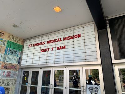 a medical mission on a building marqee